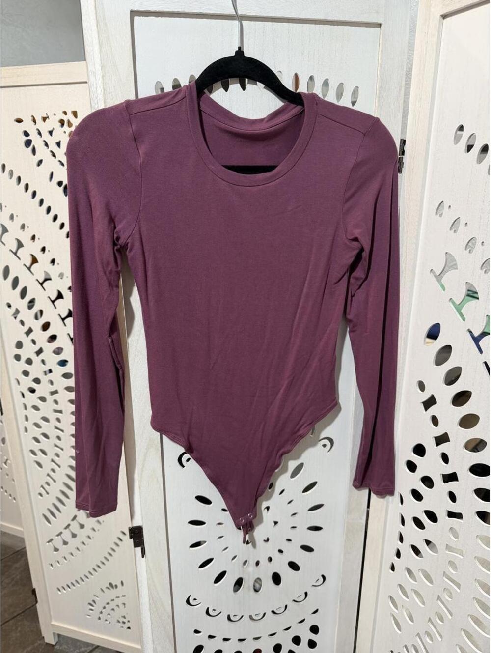 Vitality x Cosmopolitan purple bodysuit